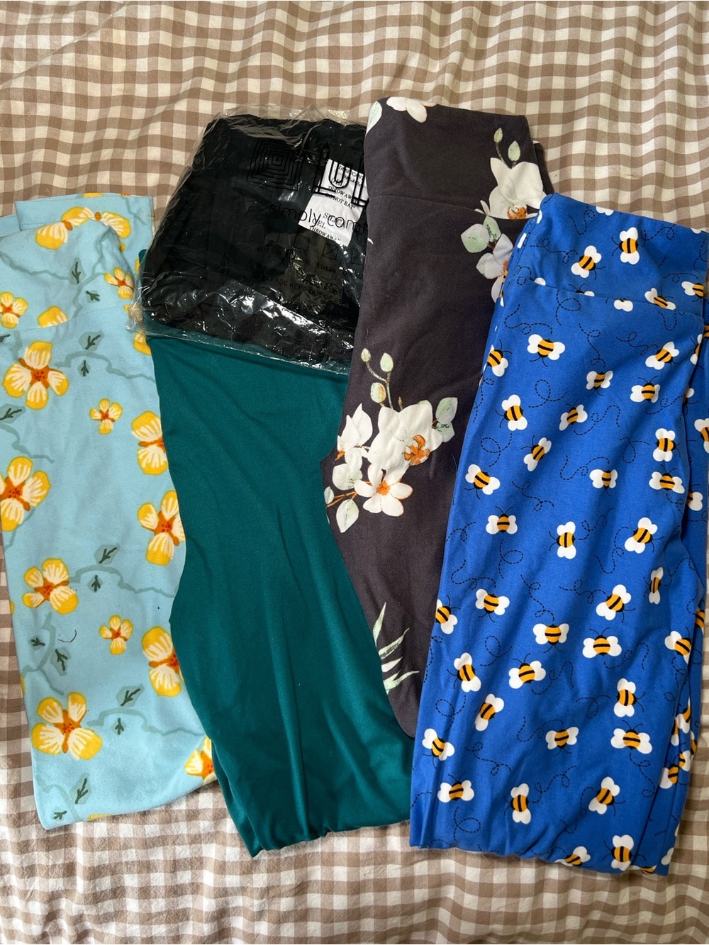 LuLaRoe White Background Sizing Chart with Multicolor Logo